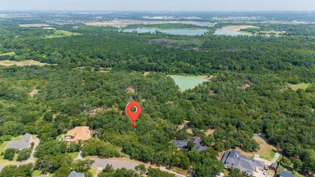 Photo of 8809 Racquet Club Drive, Fort Worth, TX 76120 (MLS # 21350236)