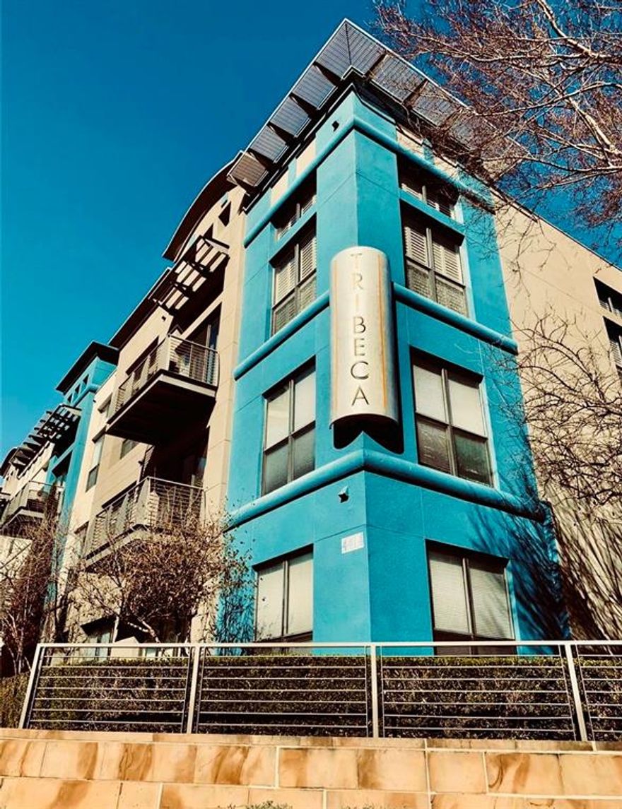 Welcome home to this charming third-floor 1-bedroom, 1 bath condo located in the heart of Dallas. Enjoy true urban living with unbeatable walkability to popular shops, dining, and entertainment right outside your door. A spacious entry welcomes you into an open-concept layout that flows seamlessly into your living area with plenty of natural light. A modern three-panel door featuring a center sliding panel and upper clerestory windows, blurring the line between indoors and outdoors while maximizing light and views.  The modern island kitchen offers generous prep space and storage, while a convenient half bath is ideal for guests. Escape to your oversized primary retreat featuring an adjoining en-suite bath and a private balcony for your morning coffee or evening unwind. HOA dues include trash, water, landscaping, exterior maintenance, and blanket insurance. Recent community updates include a newly re-plastered and retiled pool, upgraded fitness center with Peloton equipment, assigned parking #107 and more. Experience true urban comfort—schedule your showing today! Virtually Stage.