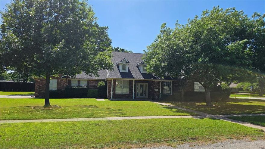 This custom built brick home has had the same owners since 2001. Now it is time to make it your own. A corner lot with approximately half an acre with city amenities is quite unique. 
All brick home with an open wooden patio deck inside a privacy fenced back yard. Landscaping and trees are established and well kept. Come see how this home can have your signature touch to make it your own!