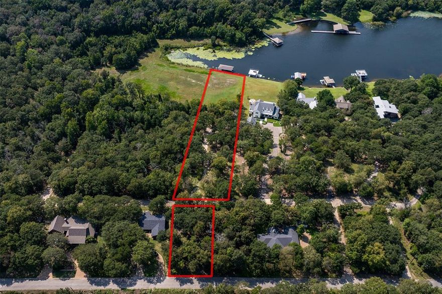 Two parcels being sold together on Lake Athens with water frontage and a private boathouse. The waterfront lot 1.37 acres has been improved with site preparation, a cleared homesite, water meter and line to the boathouse, plus underground electric with a transformer in place. Across Pleasant Run Circle, the second lot provides added privacy and space at the property’s entrance.

The covered boathouse includes a lift, storage, and direct access to open water. Located in the gated Oakwood community, Pleasant Run offers a balance of wooded surroundings and open lake views. The HOA offers a gated entrance, tennis and pickleball courts, a swimming pool, and a community activity center. A private boat ramp for members provides an additional benefit.

This is a rare opportunity to build on Lake Athens with a ready-to-develop homesite, established utilities, and an additional lot for flexibility.