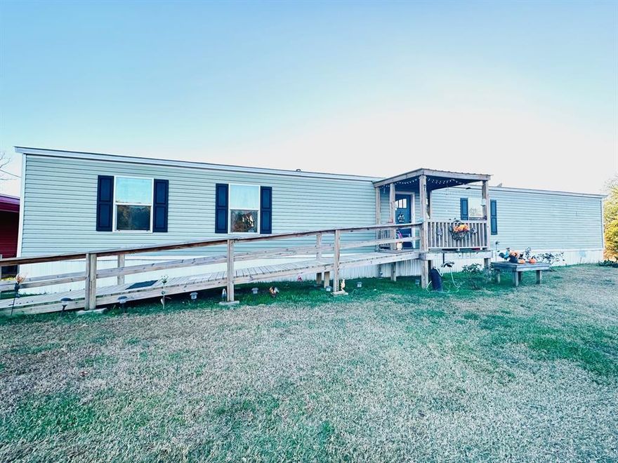 Enjoy country living on this approximately 4-acre property featuring a well-maintained 3-bedroom, 2-bath home. The functional kitchen includes a center island and ample storage. Exterior features include fenced pasture, a carport, a barn, and a horse-ready stable, offering excellent space for livestock, gardening, or hobby farming. This property provides a great blend of comfort, usability, and rural charm.