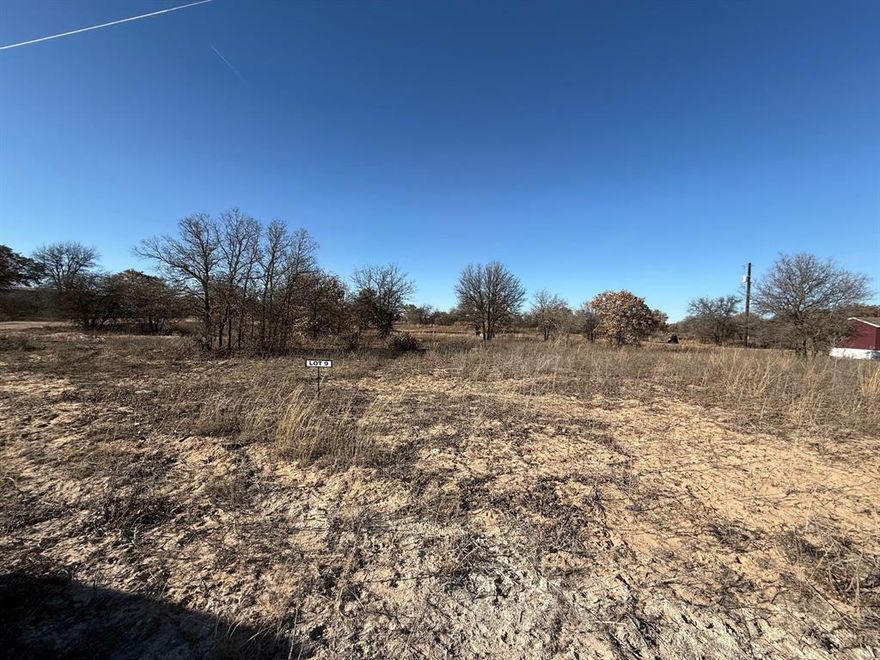 Excellent homesite in a beautiful subdivision with great trees and mobile homes welcome! Seller will owner finance with 10% down!
