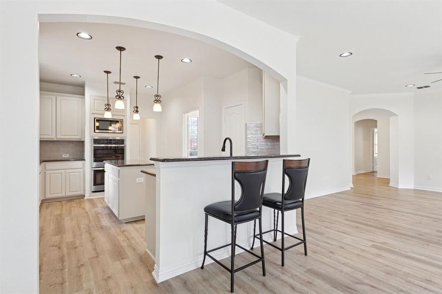 Your dream home awaits in Flower Mound!

Welcome to this charming two-story home, ideally situated in a quiet cul-de-sac with walking distance access to a beautiful park and the popular Lakeside entertainment area. This property has great potential with 2025 updates which include the kitchen with brand new appliances, primary shower, all the floors and fresh paint inside and out. This home is ready for you to make it your own.
The interior features a spacious living area with a cozy fireplace, and a large window that brightens up the entire room. The living area is connected to a versatile dining space, perfect for family dinners or entertaining guests. The kitchen provides plenty of counter space and ample storage. 
The primary bedroom offers a private retreat, while an additional bedroom downstairs to provide flexibility for a growing family, guests, or in laws.  
The large backyard is a true gem, featuring a large, mature tree that provides plenty of shade for hot summer days. The back porch is an ideal spot for outdoor dining or simply relaxing with a cup of coffee. 

Information is deemed reliable, it is up to the buyer and buyers agent to verify all the information provided.