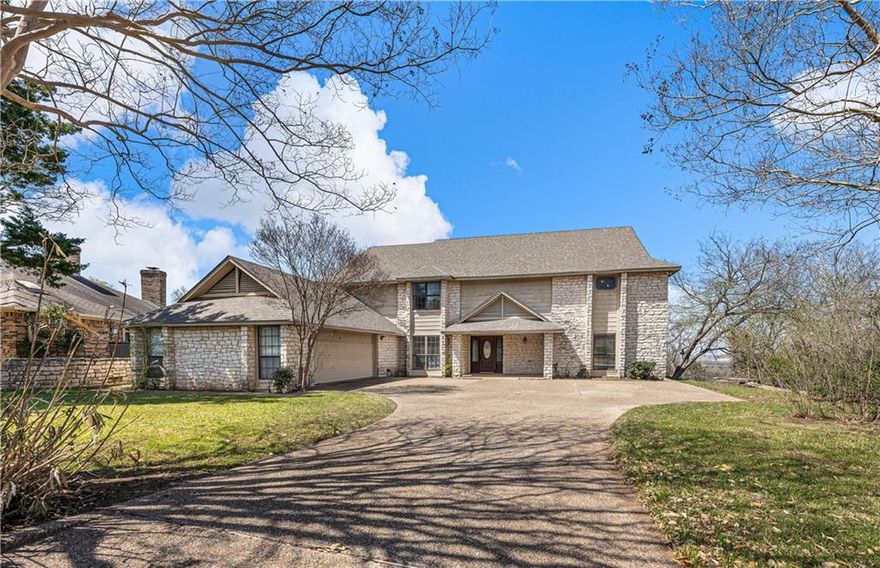 We’re thrilled you've stumbled upon our fabulous lake view home set upon the bluffs of Woodway!  Here, tremendous value and upside are paired with ultra-rare Midway Independent School District attendance (most lake view homes attend the Waco Independent School District) in a large footprint just begging to be modernized.     ~~~     Perched high above the Lake Waco in Woodway’s famed Hunter’s Mountain neighborhood, the 3,927 square foot floorplan affords magnificent flexibility across its five bedroom, three bathroom (plus a powder room!).  Soaring ceilings and floor to ceiling windows prominently display the lake views while multiple ground floor bedrooms enhance accommodation for those who prefer not to access stairs.     ~~~     Offsetting the living room, a spacious kitchen acts as a command center with its own lake views through the generous breakfast room.  Adjacent to the kitchen and living room, the formal dining room is open to the living room so it too benefits from the home’s exceptional views.     ~~~     Upstairs, three additional bedrooms, including the primary suite, and an office are neatly connected by an indoor balcony AND an outdoor balcony.  Spacious rooms, large closets (especially for the period), and tidy, well-kept amenities are on display here.     ~~~     Outside, a wrap around deck enhances sitting area while the home’s grassy side yard offers its own seating area and pergola overlooking the pool area.  Upstairs or down, there simply isn’t a bad view from anywhere on the property!     ~~~     If you’re unicorn hunting, this property is one that must be seen in person.  With a fabulous floorplan, fantastic views, and clean, well-kept condition, the possibilities are endless!     ~~~     To schedule a showing and see this exclusive home for yourself, please call or text  today!  Lake view homes tend not to stick around on this market!  To seize the day and make this distinctive residence your own, act fast!