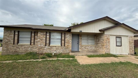 Photo of 4916 Mcdougal Street, Greenville, TX 75401 (MLS # 21403590)