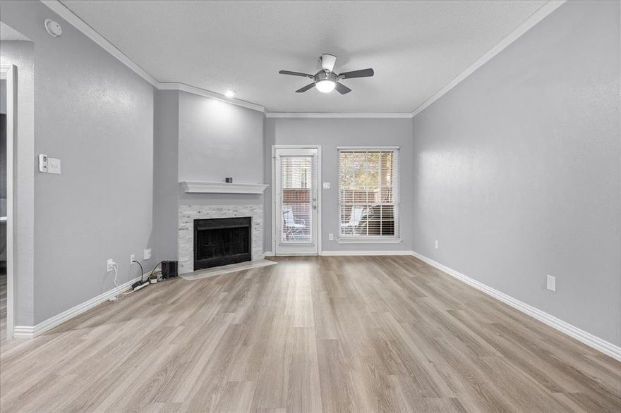 Discover a premium living experience and a coveted lock-and-leave lifestyle in this beautifully updated condo at The Oaks of Lakewood. The bright and open floor plan is complemented by luxury vinyl flooring throughout. This unit offers an exceptional outdoor space with a covered, patio that leads to a private, fenced yard, providing a perfect retreat for you and your furry friends. The community provides residents with a refreshing pool and has recently completed a full roof replacement on all buildings, ensuring peace of mind. This unit also includes a reserved covered carport spot for your convenience. Enjoy an unbeatable location within walking distance to White Rock Lake and nearby amenities like Tom Thumb, all while being zoned for the highly-regarded Lakewood Elementary. Showings begin September 5th.