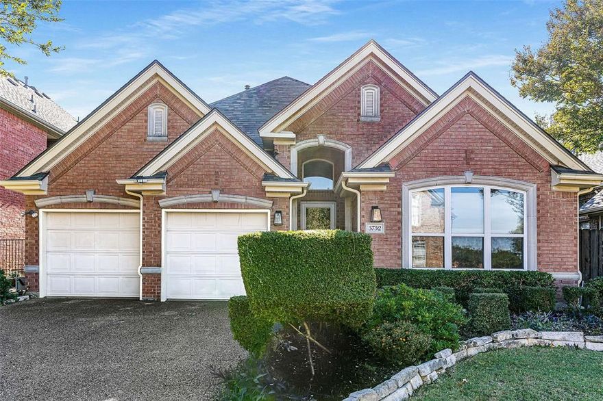 Discover this charming custom-built home nestled on a quiet cul-de-sac in the highly desirable Addison Town Center. This beautifully maintained single-story residence offers bright, naturally lit living spaces and a thoughtful layout designed for comfort and function. The kitchen features white cabinetry, a cut-glass backsplash, granite countertops, a spacious center island, double ovens, and two pantries, perfect for everyday living and entertaining. It opens to a large living room accented by a gas fireplace and custom built-in shelving and cabinetry. Adjacent to the kitchen, the formal dining room showcases rich wood-like floors, creating an inviting space for gatherings. The split-bedroom floor plan provides privacy, with two secondary bedrooms and a full bath located separately from the primary suite. One of the secondary bedrooms features French doors, making it ideal as a home office, guest room, or flex space. The spacious primary suite includes a cozy sitting area and private access to the backyard, while the primary bath offers dual sinks, an extended vanity, and a generous walk-in closet. Enjoy the benefits of no HOA and a prime cul-de-sac location with easy access to scenic walking trails, lush greenbelts, and popular dining destinations. Nearby amenities include the Addison Community Garden, Brookhaven Country Club, and the Addison Athletic Club, a 55,000 sq. ft. facility offering a gym, indoor and outdoor pools, tennis, pickle ball, and more. Additional features include plantation shutters, marble and porcelain flooring, a tankless water heater, fresh interior paint, radiant barrier, drop-down LED lighting in the kitchen and living room, epoxy garage floor, impact-resistant roofing (2023), and a fire sprinkler system throughout.