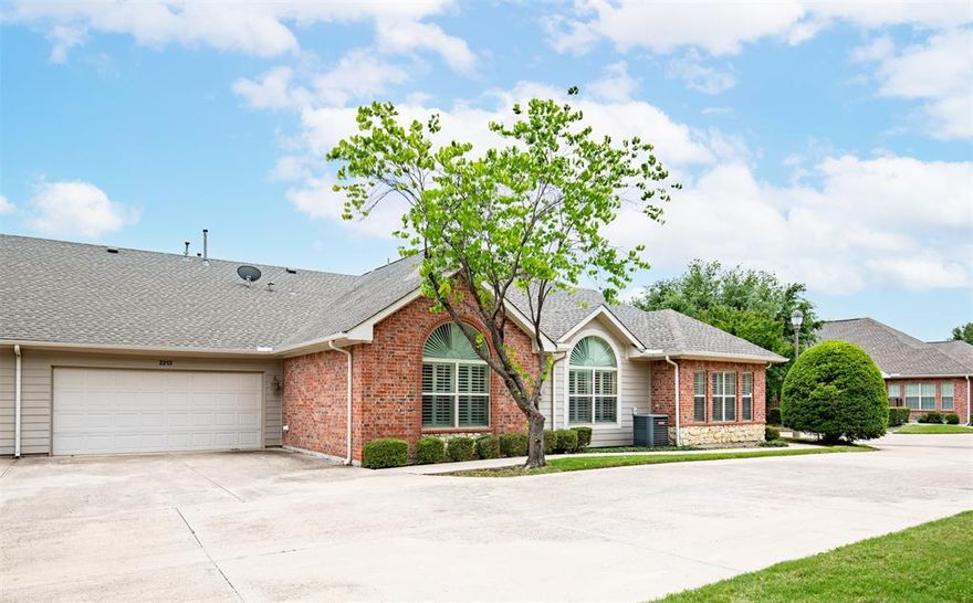 Experience easy, low-maintenance living in the highly sought-after River Bend Villas community, where comfort, convenience, and resort-style amenities come together in this beautifully designed single-story condo. Enjoy a private outdoor living space, attached 2-car garage, and access to exceptional community features including a gated entrance, clubhouse, resort-style pool, and fitness center. Inside, you’ll find a spacious and functional layout featuring 3 bedrooms, 2 full bathrooms, and a private office with elegant French doors — ideal for working from home or creating a quiet retreat. One of the home’s standout features is the expansive sunroom surrounded by windows, creating a light-filled retreat perfect for morning coffee, a cozy reading lounge, second living area, or hobby space. The kitchen is thoughtfully designed for both everyday living and entertaining with abundant cabinet storage, granite countertops, ceramic tile backsplash, breakfast bar, coffee bar, and black appliances including an electric range, microwave, and dishwasher. Freshly installed carpet and pad adds a clean, updated feel while crown molding, plantation shutters, and ceiling fans throughout enhance the home’s warm and upscale appeal. The spacious primary suite offers dual sinks, a walk-in shower, and a large walk-in closet, while the secondary bath features a relaxing jetted tub perfect for unwinding at the end of the day.