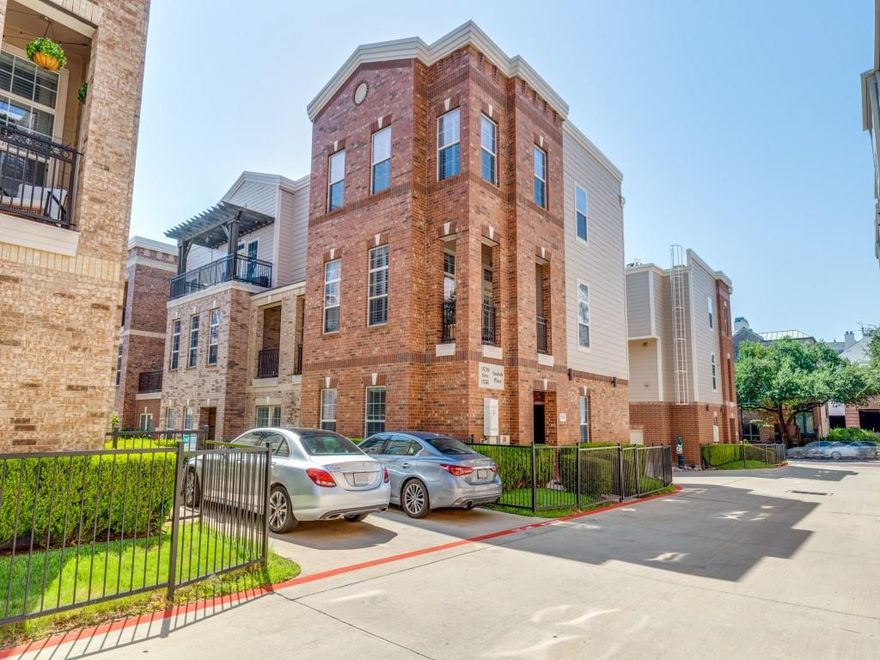 Rare end-unit townhome in the heart of Addison offering exceptional natural light with windows on 3 sides, style, and convenience! This well-maintained home features hardwood floors, plantation shutters, soaring interior ceilings, and a spacious garage with high ceilings and windows. The open main living area flows seamlessly to a private deck, perfect for morning coffee and evening entertaining. Kitchen highlights include a gas range, full size fridge, and granite counters. The expansive primary suite offers a large ensuite bath and generous walk-in closet. One of the few homes in the community with a unique fenced yard (maintained by HOA) adds outdoor living space without the upkeep. Great for pets! HOA covers water, gas, and security alarm monitoring. Unbeatable location. Walk to parks, cafes, restaurants, bars, the Addison Performing Arts Center, and more. Just minutes to Beltline Road’s endless dining and entertainment options, the new Silver Line DART station, and Dallas North Tollway. Quick drives to DFW and Love Field airports, Downtown Dallas, and Frisco. Enjoy a Free Membership to the Addison Athletic Club, year-round festivals like Kaboom Town and Oktoberfest, and abundant community events. Fiber internet available. Addison living at its best!