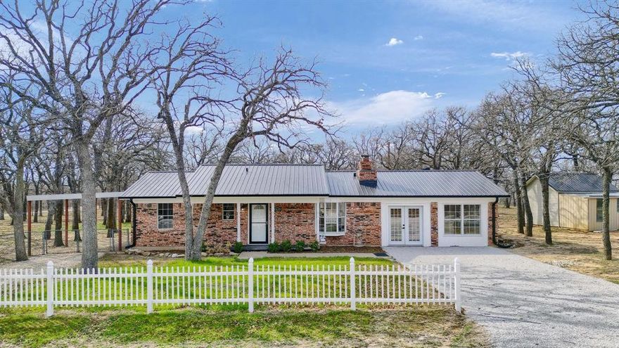 Beautiful Brick 3 Bedroom home, remodeled Lake view property with fabulous windows through out to enjoy the views. Large open kitchen has Granite counter tops with a modern farm house kitchen sink. Brand new stainless steel appliances with a gorgeous back splash to compliment the cabinets. Kitchen Overlooks the dining room and beautiful view of the back yard with lake view. Large family room and Livingroom with wood burning fire place to enjoy and entertain your guests. Open floor plan with luxury Vinyl plank floors through out the home. Master primary walks out to a fun screened in porch sunroom space to enjoy the back yard. Fully fenced back yard with fire pit area for relaxing. 2 large sheds for all your storage needs and out door gardening supplies and tools. double drive way offers you lots of parking for everyone in the family and friends, with 2 car carport. Room for your RV, boat and golf cart. There is also a Corner 2 additional lots equaling .66 of an acre to the North of the home also available if in need of larger lot, with a beautiful Lake View. Has shed and concrete pad ready for a small home or shop. contact Listing agent for details on Price. Would make a great added lot space to have an excellent lake View and add more space to spread out and enjoy your lake like experience. room for a second home or a nice shop. Nearby surroundings include historic downtown Nocona, a winery, brewery and just a short drive to Saint Jo, Muenster and popular Casinos.. In magnificent North Texas hill country in the private lakeside community of Nocona Hills. This amenity rich, 24-hour guarded gate community offers access to two private lakes. The Club house and pool are under new ownership and currently be remodled for the community, Very exciting!!!