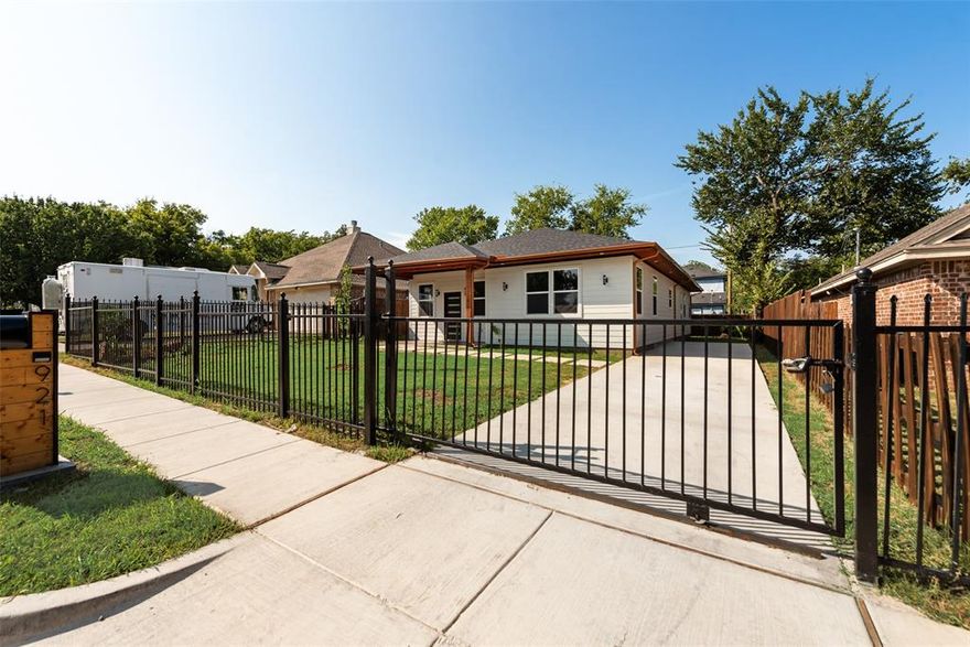 Beautifully Designed New Construction Home! 4 Bedrooms & 3 Full Bathrooms. (THIS HOME HAS TWO PRIMARY BEDROOMS) 10 Foot Ceilings Throughout The House. Home Is Fully Gated-Fenced For Privacy. Driveway Extends From The Street Entrance To the Backyard. The House Includes Costume Cabinets, Refrigerator, Electric Range, Microwave and Dishwasher - Laminated Wood Flooring, Porcelain Tile on Restrooms. Deck on the back. . . Schedule Your Showing Today!!!