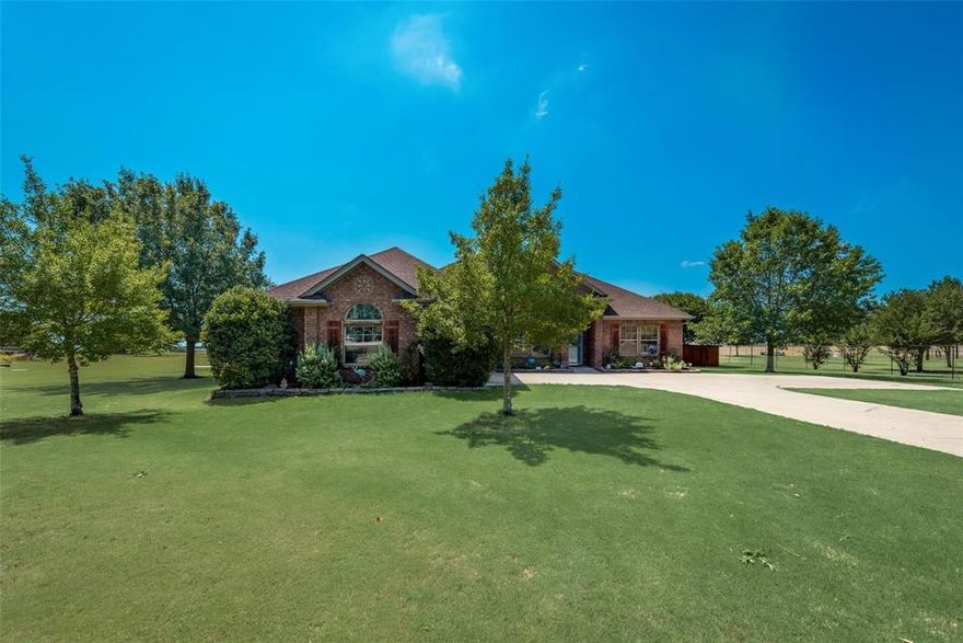 If you're looking for the perfect home just outside the city limits, but still close to town, this is it! This stunning 3 bedroom, 2 bath, 2,212 square ft home sits on a spacious 1 acre lot just minutes from downtown Waxahachie and no HOA. The long private driveway leads to beautifully landscaped grounds and a welcoming front entry. Inside, you'll find an open and thoughtfully maintained floor plan with fresh interior paint, new epoxy garage flooring, and brand new smart appliances and customized lighting throughout the house-all easily controlled from your phone! The home features spacious bedrooms, including an oversized primary suite with a walk in closet to die for!  The large kitchen is perfect for cooking, dining, and entertaining, while the split bedroom floorplan offers extra privacy. Step out back to your own private haven- a huge covered patio ideal for relaxing or hosting gatherings. The backyard also includes a workshop with full electrical connection. This home embodies the perfect blend of modern and country charm. A rare find so close to the heart of Waxahachie.