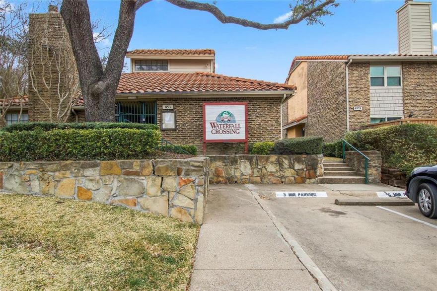 Almost completely remodeled condo in Waterfall Crossing, situated on a creek affording a very private setting….New hardwood-like flooring and fresh paint throughout. Private enclosed patio area off open kitchen and dining area facing creek….(enclosed but not covered), and which includes a refurbished storage closet with steel door.  FP in LR, half bath down. Both bedrooms are up, each with its own bath and walk-in closet. All appliances included: refrigerator, full-size washer & dryer. The location of this unit is almost a park like setting….don’t mis the serenity so close to the convenience of 635 and 75.