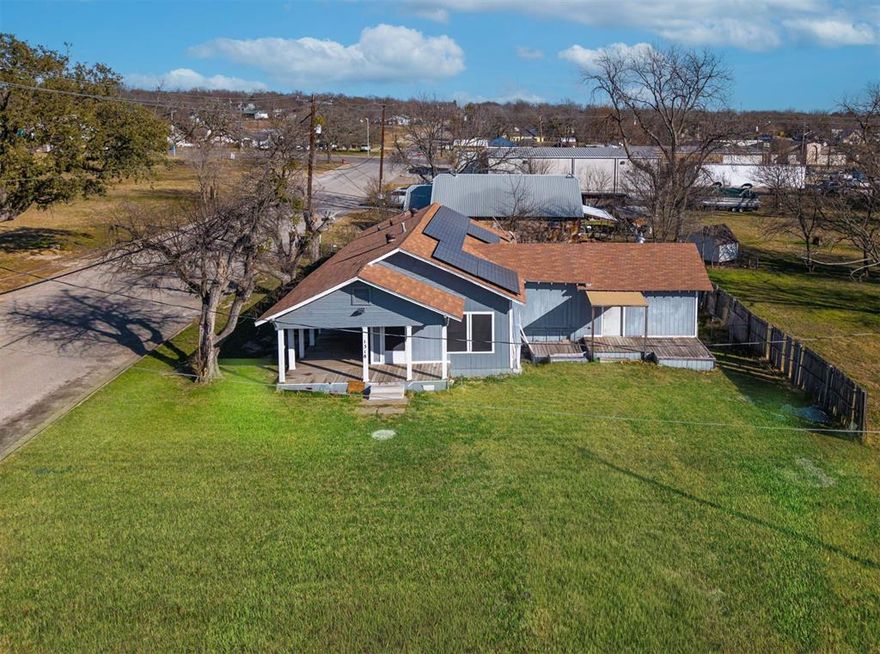 Three bedroom, one bath home with two living areas on a larger corner lot, about one mile north of the Weatherford Texas Courthouse Square.
Solar panel system is negotiable and can be removed before closing. 
Two power wall-batteries and accessories that go with the service lines are included.