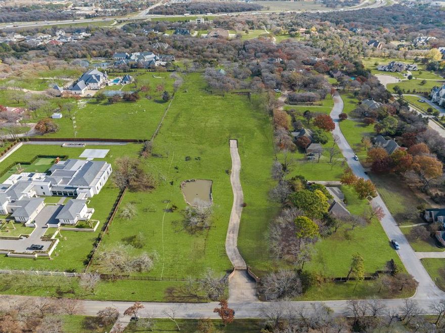 Presenting a sprawling, RARE estate lot spanning 6.76 acres along the prestigious Peytonville Avenue, showcasing enchanting mature trees and a delightful pond within the sought-after Carroll ISD. This extraordinary parcel in Southlake provides the rare opportunity to bring your own builder and shape the estate you've always dreamed of. This property enjoys proximity to exclusive country clubs, adding an extra touch of luxury. With easy access to nearby shopping destinations, 114, and more, don't let this unique opportunity slip away!