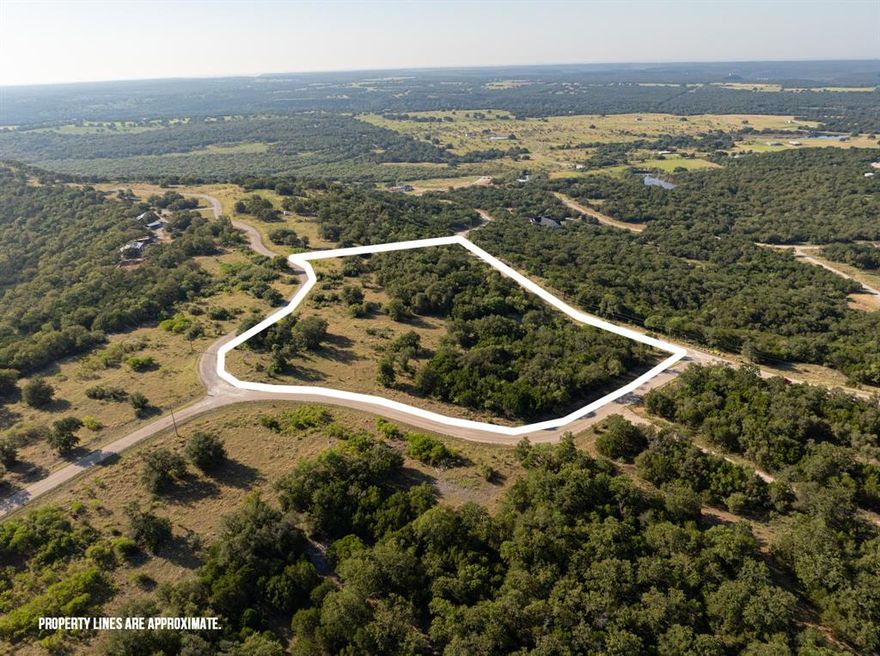 Stunning 5 acre property in the Brazos Mountain Ranch, a premier gated community. Build your own getaway cabin, barndominium, or simply enjoy your land as you see fit. Sits high on the mountain with soaring views of the majestic landscape. You'll have access to the neighborhoods private river access and the 5 acre park. 45 minutes from Possum Kingdom Lake. Palo Pinto County New State Park featuring a visitor center, playscape, pavilion, equestrian, camping, fishing and more. The property has membership in a cattle grazing association is mandatory to insure that the very important AG-Exemption remains for all.