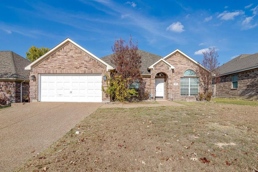 AFFORDABLE IN ALEDO ISD! Charming 3BR, 2BA home with a split floor plan, two living areas, separate dining, and a cozy wood-burning fireplace. Eat-in kitchen with island and bar. Convenient location near restaurants and quick freeway access. Enjoy a friendly neighborhood with a community pool and fun amenities.