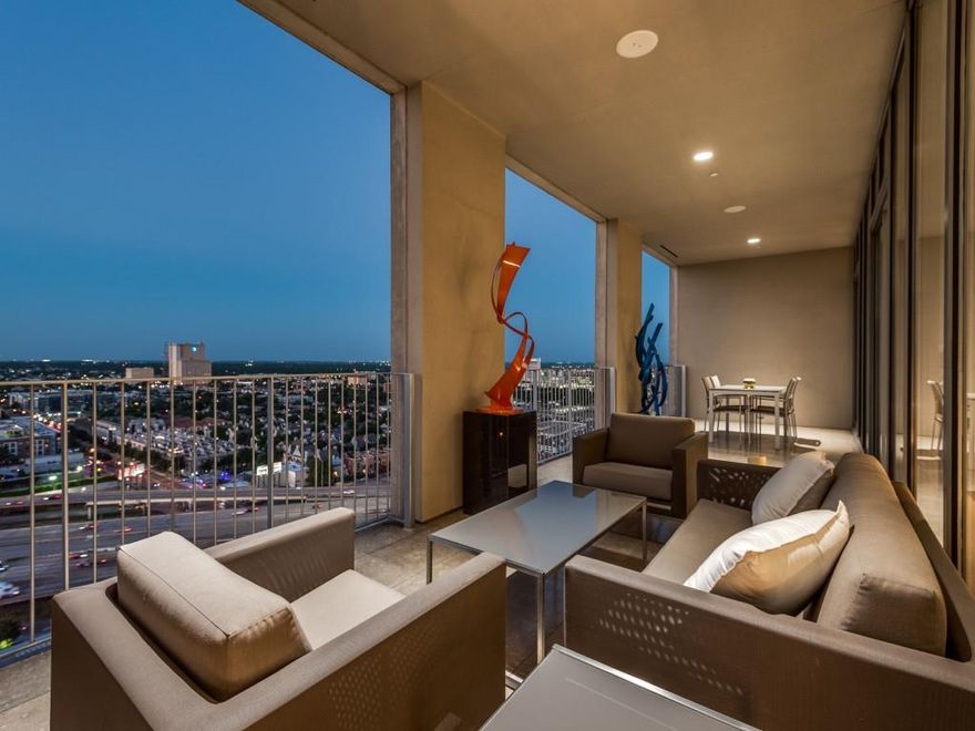 Located in the heart of the Dallas Arts District - recently named the Best Arts District in the country for the second year in a row!   This sleek, modern condo at One Arts Plaza is a masterclass in contemporary elegance, bathed in natural light and perfectly designed to highlight your fine art collections.  The kitchen features an expansive breakfast bar and seamlessly flows into the open living and dining areas.  Step out onto the large, covered balcony from the kitchen, living area, or primary bedroom, creating a harmonious space for both indoor and outdoor entertaining.  The primary suite is true retreat boasting a spacious bathroom and a generous walk-in closet.  The versatile second bedroom, ideal for both work and rest, includes a thoughtfully integrated workspace and a convenient Murphy bed.  Located in the vibrant Arts District, you'll be just moments away from The Winspear Opera House, Meyerson Symphony Center, Moody Performance Hall, the Dallas Black Dance Theatre, and Booker T. Washington High School for the Performing and Visual Arts.