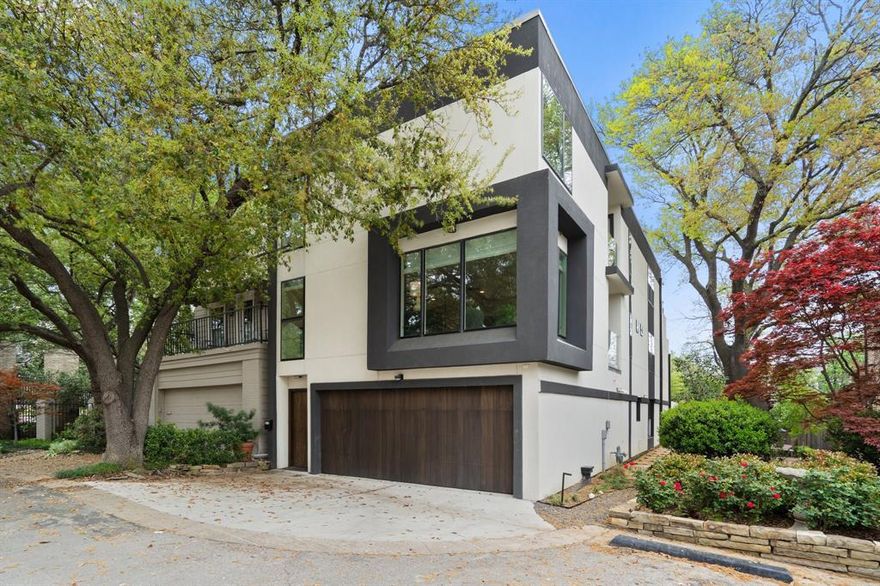 Nestled in the heart of Christopher Place, a private, gated storybook community along the picturesque banks of Turtle Creek, this completely rebuilt residence blends European charm with modern transitional elegance. Offering four bedrooms, three and a half baths, and an elevator, this home is an architectural masterpiece designed for both comfort and sophistication. The open-concept downstairs living area is bathed in natural light, featuring museum-finished walls, light hand-scraped hardwood floors, and floor-to-ceiling windows. The European-designed chef’s kitchen is a true showpiece, complete with Fisher & Paykel appliances, a gas cooktop, sleek waterfall countertops, and an expansive walk-in pantry. A gas fireplace adds warmth and ambiance, making this space ideal for both entertaining and everyday living. Designed to embrace indoor-outdoor living, this home features two private balconies and a stunning third-story rooftop deck. The second level offers a spacious balcony extending from the upstairs living area, creating a seamless flow between indoor and outdoor spaces. The primary suite also boasts its own private balcony, providing a peaceful retreat to enjoy morning coffee or unwind in the evening. Crowning this exceptional residence is the expansive third-story rooftop deck, where a sleek glass-paneled railing enhances the panoramic views of lush greenery and the surrounding community. This outdoor sanctuary is perfect for alfresco dining, sunset gatherings, or simply enjoying the beauty of Turtle Creek from above. Christopher Place is a hidden gem in one of Dallas’ most coveted neighborhoods, offering a refined lifestyle with proximity to high-end dining, shopping, and scenic trails. This is a rare opportunity to own a turnkey luxury home with exceptional outdoor spaces in an architecturally distinct community. Schedule your private tour today.