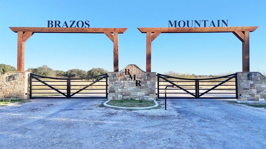 Welcome to your own wide-open piece of Texas in the beautiful Brazos Mountain Ranch community near Mineral Wells. This approximately 5-acre tract of open pastureland is the perfect blank canvas for your country dreams. The land offers gently rolling terrain with plenty of usable space, ideal for building your dream home, a weekend getaway, or simply enjoying the peace and quiet that only the country can provide. Here, you’ll find room to breathe, wide blue skies stretching in every direction, and stunning sunsets that paint the horizon in color every evening. Brazos Mountain Ranch is a private, gated community designed for those who appreciate the outdoors and the slower pace of country living. Residents enjoy private river access to the Brazos River, a friendly rural atmosphere, and the kind of natural beauty that reminds you daily why Texas living is second to none. Whether you want to keep horses, raise a few animals, or just relax surrounded by nature, this property provides endless possibilities. Located just a short drive from Mineral Wells and Palo Pinto Lake, you’ll have access to local dining, shopping, and recreation while still feeling miles away from the noise of the city. With the right mix of open space and community, this property invites you to build, explore, and make lasting memories under the Texas sky. Come see what makes Brazos Mountain Ranch so special — and picture your next chapter beginning here.