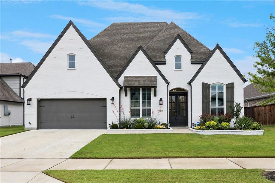 This is a place you can genuinely call home. This stunning, immaculate property showcases a variety of upgrades, including shutters, a whole-home generator to eliminate power outages, enhanced appliances, fashionable hardware, & so much more. The exquisite engineered hardwood floors flow beautifully throughout this spacious 3,202 square-foot ranch-style residence.
Each bedroom features a private bathroom, complemented by a convenient half bath for guests.
The versatile laundry room is perfect for crafting or any hobby you adore. An office filled with natural light, complete with built-in bookshelves, adds to the allure. Additionally, there’s a library outfitted with built-in cabinetry, ready for your personal touch.
This home even boasts a dedicated coffee bar room! When I say it has everything, I truly mean it. Thoughtfully designed with meticulous attention to detail, this property is a must-see. With two air conditioning units, two water heaters, & so much more. 
Imagine savoring your morning coffee, surrounded by lush landscaping that offers both privacy & beauty. The outdoor is also plumbed for a gas grill!
Inside, you’ll discover a gourmet kitchen that will delight any culinary enthusiast, featuring top-of-the-line appliances, ample counter space, and a large island ideal for entertaining. The open-concept living area is designed for comfort and style, with a fireplace that creates a warm and inviting atmosphere.
The master suite serves as a sanctuary, with a sitting area & offering a spa-like bathroom with a soaking tub & a walk-in shower, as well as a spacious walk-in closet that caters to all your storage needs.
Every corner of this home radiates elegance and sophistication, making it the perfect retreat from the hustle and bustle of everyday life. Whether you’re hosting a large gathering or enjoying a quiet evening alone, this home provides an ideal backdrop for all of life’s moments.
It’s not just a house; it’s a space where memories are created.