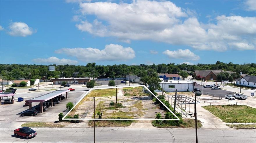 The property at 3607 East Rosedale St, Fort Worth, is a 0.56 acre (24,420 sq ft) lot zoned for commercial use. This parcel is ideally situated in a high traffic area with double road frontage offering excellent visibility and accessibility. More than 100k population within 3 miles radius. Old building in the lot has been demolished. Google map still shows old demolished building in the lot. Zoned as Commercialnec, it can be great place for retail or office development, it's perfect for a new business venture or expansion. Utilities are available at the site, and the location is close to major highways and attractions. Texas Wesleyan University is in walking distance or a minute drive from the lot. Nestled in the heart of the city, this commercial lot offers a unique opportunity to establish a thriving business.