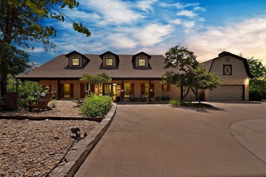 Welcome to your dream estate in Remuda Ranch Estates: a stunning 4-bed, 2.5-bath home spanning 4,381 sq ft on 3.44 acres. This gated, move-in-ready gem blends modern luxury with timeless charm—no HOA fees or city taxes!
Grand Interiors: Open-concept great room with a massive stone fireplace and pellet stove for cozy nights. Dramatic second-floor overlook adds airy elegance. Gourmet kitchen boasts granite counters, new appliances, fixtures, and ample storage.
Unique Touches: English-imported stained glass doors on the first floor; master bath with restored antique clawfoot tub. Second floor features antique doors from silent film star Anne Sheridan's childhood home, plus oversized closets in every bedroom—hallway and bathroom closets add significantly more storage options.
Outdoor Paradise: Vast front and rear porches for sunrise and sunset views; 6-person hot tub with hilltop panoramas. Endless backyard perfect for fireworks holidays, visible for miles. Abundant wildlife on HOA maintained trails.
Storage & Fun: Attached 3-car garage with high ceilings and finished bonus room. Plus, a 35×40 insulated shop with oversized remote doors, awning, parking, and commercial basketball hoop for outdoor play.
Prime Spot: Easy access to I-30, Aledo schools, shopping, and downtown Fort Worth. Energy-efficient 4-zone geothermal HVAC saves thousands on utilities.
Own this secluded Fort Worth treasure—ideal for families, entertainers, or retreats!
