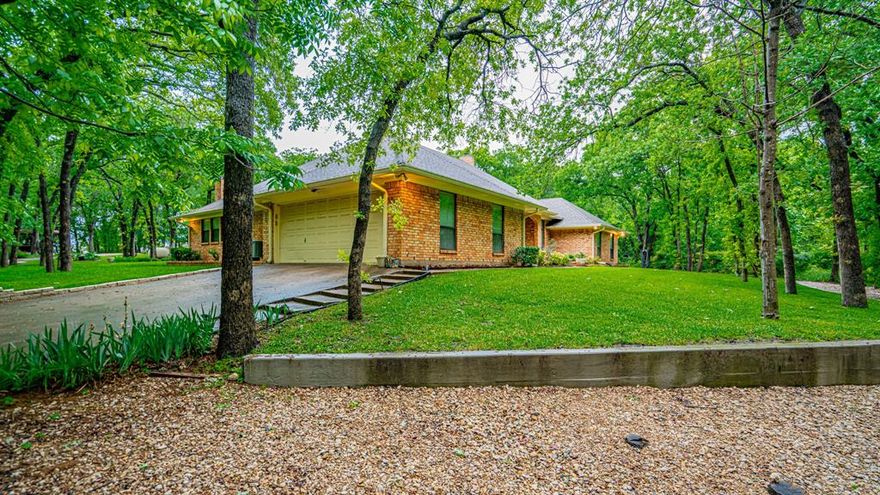 Country Estate! Approx. 29 Acres, loaded with oak and pecan trees. This place has it all, commercial  Pecan orchard, sandy soil for horses or cattle, 40 X 80 shop with office space, and lots of storage. Custom quality-built 4 bedroom, 2.5 bath, two living areas, formal dining, sunroom, and spacious master suite. Extensive landscaping, very private location yet close to Acton. Two windmills, paved drive, a rare find in this location!
Property has 3 water wells including the windmills. The home is serviced by AMUD water.