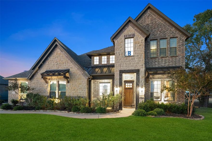 Experience refined country living in this impressive 4,000+ SQFT residence located in the desirable Chapel Creek Farms community of Van Alstyne. Set on over an acre with wide-open views, this home seamlessly blends luxury finishes with a peaceful, spacious setting.
From the moment you arrive, the striking brick and stone façade delivers standout curb appeal. Inside, the home showcases exceptional craftsmanship, including solid wood doors and elegant architectural details throughout. The gourmet kitchen is designed to impress, featuring stainless steel appliances, double ovens, a gas cooktop, a large island with seating, under-cabinet lighting, and beautiful arched openings that add character and warmth.
The open-concept living area creates a welcoming space ideal for both entertaining and everyday living. The primary suite offers a private retreat, complete with a sitting area and scenic views of the surrounding countryside. The ensuite bath is thoughtfully designed with dual vanities, a walk-in shower, and a relaxing corner soaking tub.
Upstairs, you’ll find a spacious game room and a dedicated media room perfect for movie nights, entertaining guests, or creating the ultimate family hangout space.
Additional highlights include decorative iron balusters, a covered patio for outdoor enjoyment, and a built-in gas line ready for grilling. The expansive lot provides endless possibilities, whether you envision adding a workshop, detached garage, or additional outdoor features. An extended driveway offers ample parking and flexibility.
Chapel Creek Farms is known for its quiet atmosphere, generous lot sizes, and strong sense of community ideal for those seeking space without sacrificing convenience. Located just minutes from major employers, including Texas Instruments in Sherman. Easy access to US-75 corridor for shopping in:McKinney, Allen, Frisco, this home offers the perfect balance of accessibility and tranquility.