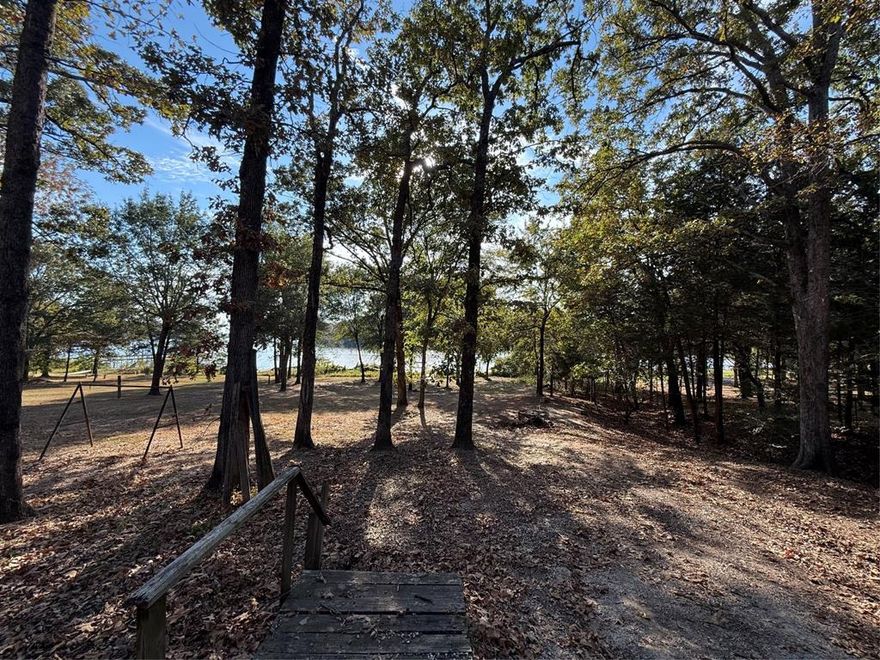 This is a rare find! 2 waterfront lots on Lake Fork! Located in the highly sought after White Oak Shores Community at Lake Fork Reservoir in fabulous East Texas.  This is a gated community with recreational facilities, community pool and an outstanding private boat ramp and dock.  This listing includes a 2015 RV camper Mountaineer Edition.  There is a cozy add on that needs some TLC and a spacious back deck that needs a llittle love too. There is a very large leaseback and a fishing dock on the property. Bring your hammer and imagination and you will have a fisherman’s dream!