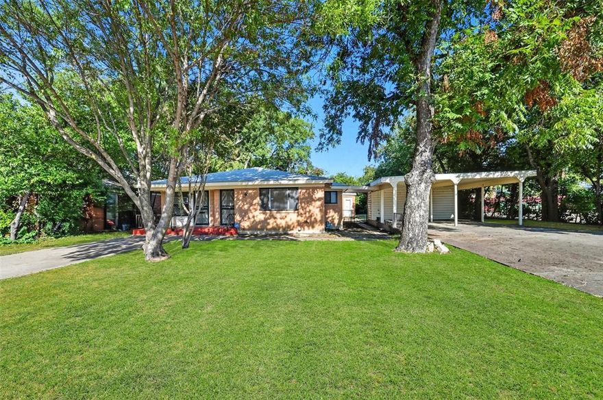 This fantastic home offers two spacious living areas, four bedrooms and three baths — all just steps from TCU. Enjoy beautiful hardwood floors, a granite-topped wet bar and an eat-in kitchen with abundant cabinets and counter space. With five separate entries, this property is ideal for students, a multi-generational household, or a home office setup. The large backyard is perfect for outdoor living, and the carport features keyed storage with plenty of additional street parking. Also, this house is within walking distance to TCU, popular restaurants, and shopping!