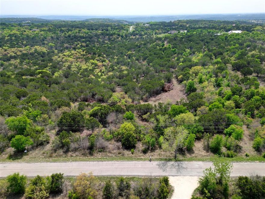 Welcome to this breathtaking 5 plus-acre property located in the highly desirable Mountain Lakes community of Bluff Dale, Texas! This exceptional piece of land is the perfect canvas for your dream home, offering cleared areas for a driveway and two prime building sites—making it easier than ever to start building your vision.  Surrounded by rolling hills and stunning natural beauty, this expansive lot provides the privacy and serenity you’ve been looking for, with ample space to explore, create, and enjoy panoramic views. Whether you're planning a weekend retreat or a forever home, this property delivers both peace and possibility.  As a proud owner in the Mountain Lakes community, you’ll have access to incredible amenities, including a sparkling lake for fishing and kayaking, a scenic park with picnic areas, a playground, and a refreshing community pool. A new survey with property markers is already in place, saving you time and money.  Don’t miss your chance to own a piece of paradise in one of Texas’ most scenic and welcoming communities—where nature, comfort, and lifestyle come together. This is the perfect place to build your dreams!