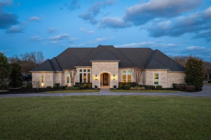 Welcome to this exquisite custom-built home by Dave R. Williams, located in the prestigious Whispering Farms community within Prosper ISD. This single-story masterpiece spans across 1 acre and offers 4 spacious bedrooms and 5 luxurious baths, designed with the highest quality finishes throughout.
As you arrive, you're greeted by a grand circular drive leading to a three-car garage, providing both convenience and elegance. Step inside to discover a thoughtfully designed open floor plan featuring high-end luxury finishes at every turn. The gourmet kitchen is a true chef’s delight, equipped with premium Wolf appliances and a Sonic ice machine, perfect for entertaining and everyday living.
The media room offers the ultimate cinematic experience, complete with hidden pocket doors for added privacy and style. The owner's suite is a serene retreat, offering both his and her facilities with heated floors, ensuring comfort and relaxation at all times.
Outside, the home is designed for relaxation and enjoyment, with a sparkling pool and spa surrounded by lush landscaping, offering an inviting space for both intimate gatherings and grand outdoor events.

This exceptional residence combines modern sophistication with thoughtful design, creating a home that provides both luxury and functionality for the discerning buyer.