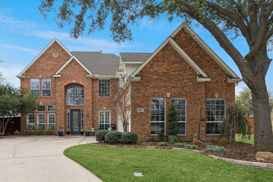 Nestled in the sought-after Heritage HOA master planned community, this beautifully maintained home offers extensive upgrades that enhance comfort, efficiency, and long-term value. Inside, the desirable floorplan features tall ceilings, plantation shutters, generously sized rooms, double staircases, and abundant custom storage with built-in shelving and cabinetry. The main level primary suite provides a serene retreat with granite vanities, a relaxing garden tub, and a spacious walk-in closet. A guest room with its own private full bath is also conveniently located on the first floor. The spacious kitchen is ideal for daily living and entertaining, offering ample cabinetry with pull-out drawers in all lower cabinets and the pantry, a coffee bar, center island, premium granite countertops, Bosch dishwasher, smart-touch faucet, and a new induction cooktop. Upstairs includes two oversized bedrooms—each with walk-in closets and a shared Jack and Jill bath—plus a large game room, a media room wired for 5.2 surround sound, and a bonus room with built-in cabinetry and desk perfect for study or crafting. The 3-car garage features upgraded polycuramine flooring for durability and a clean finish. The level, private backyard includes space for play or a future pool, along with a cedar-covered patio with ceiling fans, outlets, and canned lighting for year-round enjoyment. Major updates include a new first-floor AC and furnace, landscaping with new trees, stone edging and pavers, a Low-E back door and new energy-efficient windows, two new hot water heaters with recirculating system, a Class 4 hail-resistant roof, smart Wi-Fi thermostats, a Hunter Wi-Fi irrigation controller, surge and lightning protection, updated lighting, and more! Enjoy Heritage’s amenities—7 pools, splash park, fitness center, clubhouse, playgrounds, volleyball, tennis and pickleball courts, miles of trails, HOA events, Keller ISD schools, and a prime location near shopping and dining.