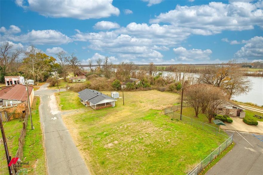 Welcome to 2036 Abney St in Coushatta—where move-in-ready comfort meets river lifestyle living. This beautifully renovated home has been completely redone from top to bottom, with every room and the bathroom fully updated, fresh interior paint throughout, and a brand-new roof, giving the next homeowner total peace of mind from day one.

Enjoy rare privacy with no neighbors to the side or left of the property, creating a quiet, open feel that’s hard to find. The backyard offers peaceful water views, a storage shed, and the ultimate bonus—you’re just a short walk to the nearby boat dock with direct access to the Red River, perfect for boating, fishing, or simply enjoying the outdoors.

Inside, the home is truly the definition of turnkey. The kitchen appliances (refrigerator, microwave, and stove) will be installed and included with favorable offer.  A 2-car garage adds convenience and storage, rounding out this well-thought-out property.

Whether you’re looking for a primary residence, weekend retreat, or river-adjacent lifestyle, 2036 Abney St delivers location, privacy, and quality—all in one package. Schedule your showing and see what 2036 Abney ST living is all about. Reach out to Listing Agent to schedule your private tour today!