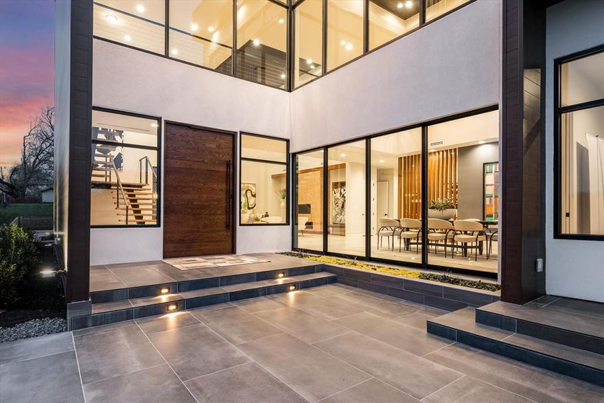 Introducing an architectural masterpiece crafted by B3 Home Builders, this newly constructed modern estate epitomizes luxury living. Nestled on over an acre just off the esteemed White Chapel Boulevard in Southlake, you will find the feeling of country living but just blocks from Southlake Town Square. The striking facade immediately captures attention, with clean lines and sleek finishes that reflect its modern design that showcases the  meticulous attention to detail at every turn. Expansive windows adorn the walls, bathing the interiors in abundant natural light and offering panoramic views of the lush surroundings, creating a sense of connection with the outdoors. One of the highlights of this remarkable home is its dual primary bedroom suites, located upstairs and downstairs. Beyond the luxurious interiors, this estate is also designed for outdoor enjoyment and recreation with plenty of room that allows homeowners to create their own private oasis beyond the louvered Pergola.