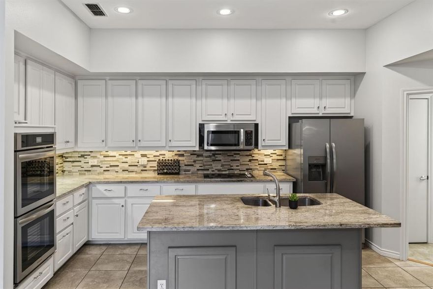 This isn’t your typical townhome. It’s the rare find that truly feels like a house. With no shared walls, an attached garage, and the breathing room of a single-family home, you get the best of both worlds: privacy and low-maintenance living in one thoughtfully updated package. Plus, the HOA handles front yard watering and maintenance, so your weekends stay yours. Zoned for highly sought-after Brentfield Elementary, this three-story, 4-bedroom, 4-bath home is move-in ready and full of character. The heart of the home is a beautifully renovated kitchen with crisp white cabinetry, granite countertops, double ovens, and an oversized island perfect for gathering. The extensive 2020 renovation included new windows and plantation shutters, fresh paint, updated lighting, solid core doors, a new garage door and opener, and a refreshed fireplace. Wood floors on the second and third levels were also replaced by the current owners, adding warmth throughout. The upstairs HVAC system was replaced in 2018 for added peace of mind. One oversized secondary bedroom features an attached full bath, making it an ideal second primary suite. Every bathroom has been fully remodeled with clean, modern finishes. On the third floor, a spacious bonus room with closets offers flexible space for a media room, office, gym, or even a fifth bedroom. The community pool is just steps away. Private. Polished. Perfectly located. This one checks all the boxes.
