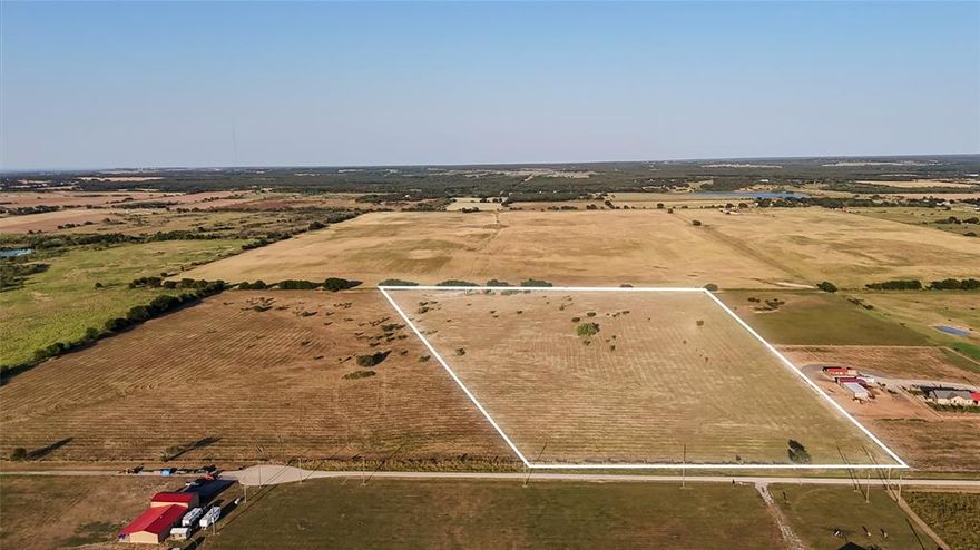 22 acres + or - ag exempt flat land, fenced on 3 sides already with some trees for shade. Just off 281. 35 minutes from Weatherford and an hour from downtown Fort Worth. Tremendous possibilities!! Great soil, could be for hay production, excellent for equine, etc.  Local water wells are confirmed to be strong.  Choose your own builder. Barndos welcome. New survey will be needed.
