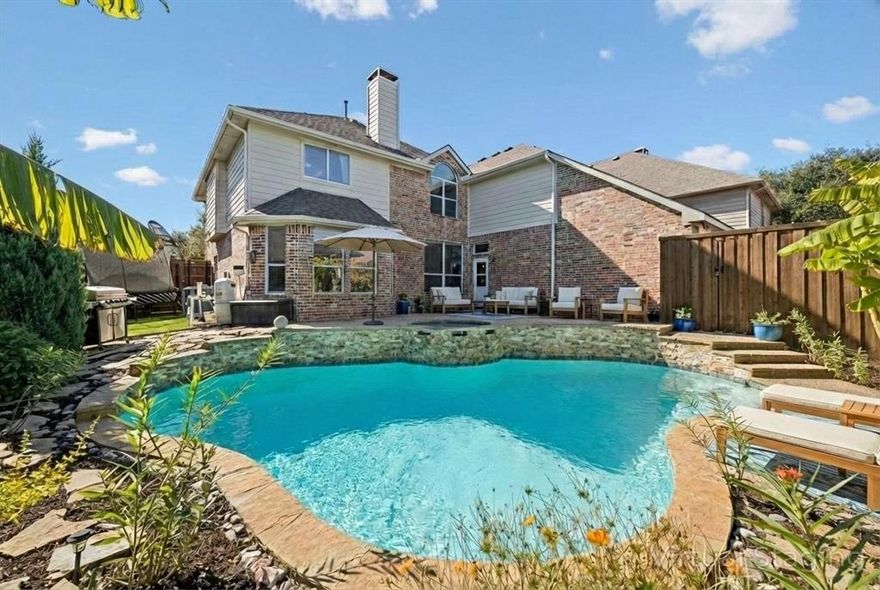 Welcome to the largest floor plan in Spring Meadow, thoughtfully updated and professionally staged to showcase its spacious, flexible layout and true move-in ready appeal. This 5-bedroom home with pool and spa offers an exceptional blend of size, function and lifestyle in a prime Allen location.
The open-concept first floor is designed for both everyday living and entertaining, featuring formal living and dining, a bright breakfast nook and a renovated kitchen with stainless steel appliances, white cabinetry, granite countertops, single-basin sink and planning center workspace. A secondary bedroom and an oversized primary suite with bay-window sitting area and custom closet complete the main level.
Upstairs expands the living space with a versatile loft, three additional bedrooms, two full baths, a game room and a dedicated media room, ideal for multi-generational living or hosting.
Interior highlights include engineered wood flooring throughout living areas, bedrooms, and staircase, with tile in wet areas and carpet limited to the media room.
Step outside to a private backyard retreat featuring a pool, spa, extended deck, and low-maintenance artificial turf, perfect for relaxing or entertaining.
Additional features include an oversized 2-car garage with added storage.
Conveniently located minutes from Allen High School, Eagle Stadium, H-E-B, Topgolf Allen, Watters Creek at Montgomery Farm, Allen Premium Outlets, and The Village at Allen for shopping, dining and entertainment.