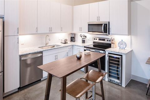 Photo of 3383 Cedarplaza Lane #304, Dallas, TX 75235 (MLS # 21198947)