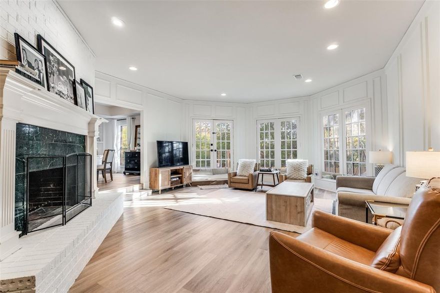 Tucked away in a charming, established neighborhood within one of Dallas’s most sought-after areas, this home backs to a tree-lined creek with views from every window. This rare creek lot offers privacy and a serene natural backdrop. Fresh exterior paint and a brand-new roof set the tone, while a long list of thoughtful upgrades and updates throughout make this home truly move-in ready. Inside, a dramatic and welcoming entry creates an immediate sense of space. The living area is the heart of the home—generous in scale, anchored by a cozy fireplace, and framed by picturesque views that bring the outdoors in. A versatile formal dining space off the kitchen (complete with updated wet bar) makes this home fabulous for entertaining. Upstairs, all three oversized bedrooms are thoughtfully positioned for privacy. The primary suite is a standout, boasting stunning views and a tranquil retreat-like feel, including a private balcony and fully updated primary bath. With its exceptional setting, downstairs HVAC and furnace replaced in 2024 and upstairs HVAC in 2025, new deck and fence + other extensive improvements throughout, this home offers a rare opportunity to enjoy both comfort and location in one of Dallas’s most prestigious pockets with no HOA!