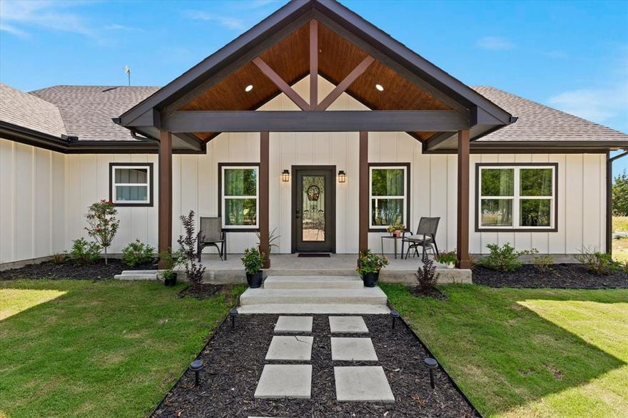 Charming farmhouse nestled on a picturesque 2.85-acre property adorned with mature trees. The whiteboard and batten
design, As you step inside, you enter a spacious open living area featuring a stunning beamed ceiling. The heart of this
farmhouse in the kitchen, complete with a central island and custom cabinets, A delightful coffee bar awaits, perfect
for indulging in your morning brew. Retreat to the primary bedroom, with a luxurious master bathroom, double vanity,
a walk-in closet and a convenient door connecting to the laundry room. Step outside onto the back patio expansive
yard for outdoor activities, gardening, or simply unwinding in nature's embrace. The guest house awaits, offering two cozy
bedrooms and one bathroom, ensuring a comfortable stay for family and friends or an income property. Country living,
offering a tranquil escape with modern conveniences and the opportunity to experience rustic charm and contemporary living
in this farmhouse. The property includes a 1,000 sq. ft. guest house with two bedrooms and one bath, ideal for visiting family, a private retreat, or income potential. Experience the best of both worlds, rustic charm and modern comfort, in this 2,001 sq. ft. farmhouse, where every detail invites you to slow down, breathe, and enjoy the beauty of country living.