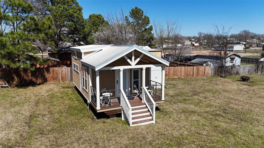 MOTIVATED SELLERS!!! PERFECT FOR SHORT TERM RENTAL!!! Welcome to this charming 1-bedroom, 1-bathroom home (with a loft) perfect for both full-time living and weekend getaways. Nestled in a serene, gated community, it features a private boat ramp, fishing dock, community pool, playground, and a tranquil pavilion with lake views for grilling and relaxation. The spacious driveway easily accommodates your car, boat, and recreational gear. Whether you prefer a leisurely walk or a golf cart ride to the lake, this property promises relaxation and convenience. Only a quick 10-minute drive from downtown Quitman, offering dining, coffee shops, and antique stores. Holiday Villages of Lake Fork Homeowners fee is $52 per month.