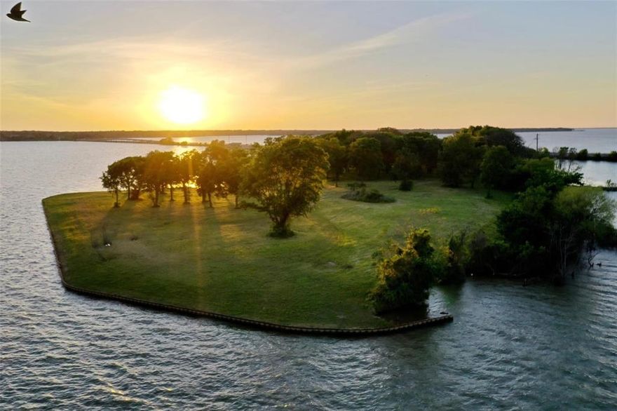 An extraordinary opportunity awaits on Cedar Creek Lake! A rare, perfectly positioned 10.68-acre property offering limitless potential. With more than 2,600 feet of expansive open-water views and approximately 1,700 linear feet of shoreline stretching to a protected lagoon, the setting is both breathtaking and versatile. Mature trees blanket the property, creating a secluded, resort-like atmosphere that feels worlds away, yet remains easily accessible within one of Texas’s most sought-after lake markets.  The blend of privacy, panoramic waterfront, and development flexibility makes this a truly exceptional investment opportunity. Envision a luxury RV resort with premier waterfront amenities, a boutique marina, an executive retreat, mixed-use waterfront development, private family compound, estate property, or thoughtfully designed condo or hotel accommodations.
Rare in acreage, extraordinary in shoreline, and unmatched in possibility, this is a property that inspires imagination—ready for the right visionary to transform its natural beauty into something remarkable.