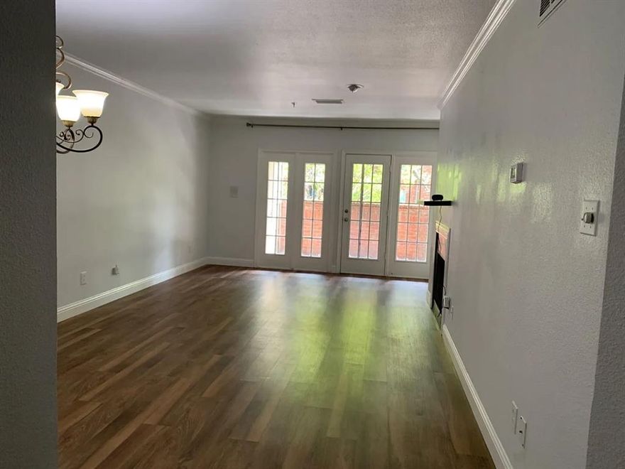 What's Special: FULL-SIZE WASHER AND DRIER. Bonus 15 days free rent-contact us today. Beautiful first-floor 2-bed, 2-bath condo (1,015 sq ft) in the highly regarded Highland Park Independent School District (HPISD). Ready for move-in. Located in a fantastic neighborhood 0.2 miles (5 minutes walking distance) to Highland Park High School, 7 minutes ' drive to SMU, and 10 minutes ' drive to UT Southwestern Medical Center. Includes a fridge, range oven, and water heater, all bought last year. Comes with a full-size washer and dryer, and easy-to-maintain vinyl and tile flooring. The secured underground garage offers free parking spaces with gated access and is equipped with an elevator and convenient shopping carts for residents. Water is included in the rent.