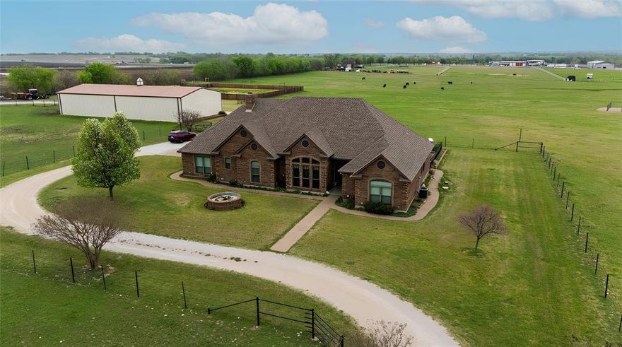 26.48 acres!! A stunning horse property with a custom-built 4-bedroom 3.5 bath home, high ceilings throughout the home and large windows overlook the swimming pool and waterfall. New luxury vinyl flooring and granite countertops. Custom built front door. Fantastic floorplan with a family in mind. Oversized garage 27 ft x 26 ft.  Huge 95 ft x 45 ft metal barn with (5) 12 ft x 12 ft custom horse stalls. Concrete floored storeroom, tack room with roll up door. Cutting arena 125 ft x 125 ft with excellent sand footing and viewing stand. Cattle pens and loading chute. Picturesque stock pond. Coastal Bermuda pastures currently used for cattle grazing. Fenced and cross fenced. Gated entry. A fantastic property in every way.