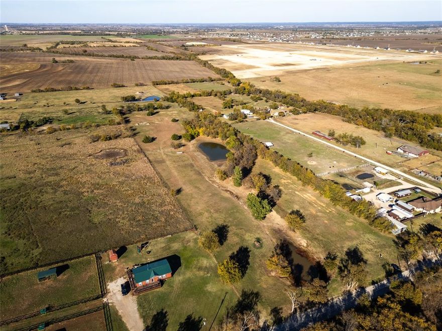 Beautiful 9 acre lot located in Sanger, TX. Great opportunity to build your own personal homestead. This lot offers mature trees and a beautiful pond on a paved road. New buyer will need to speak with Boliver Water regarding water services. Buyer and buyers agent to verify all MLS information.