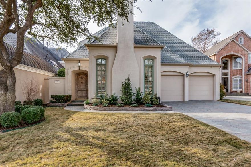 Tucked away in a private, gated Dallas community, this beautifully updated 3-bedroom, 3.1-bath home offers an exceptional blend of refined style and tranquil natural surroundings. Overlooking a lush, tree-lined creek, the home features two spacious living areas designed for both everyday comfort and effortless entertaining. The inviting kitchen is rich with warmth and functionality, showcasing a large center island. The first-floor primary suite serves as a peaceful retreat, complete with serene views of the patio and creek. Additional highlights include a study, an oversized laundry room, and a custom-designed primary closet. Offers front and rear gated entry and a home generator.