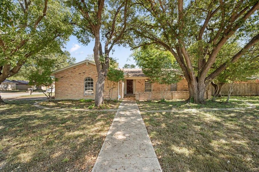 Charming 3-bedroom, 2-bath home tucked away on a quiet cul-de-sac in Haltom City. This corner lot offers a large yard, no HOA, and plenty of parking, including a side-entry two-car garage and extra-wide driveway. A cozy front courtyard greets you at the entrance, perfect for morning coffee or relaxing in the evening. Inside, you will find a functional single-story layout with two dining areas, a comfortable living room featuring a wood-burning fireplace, and a galley-style kitchen with a breakfast bar. The primary bedroom offers its own bathroom and walk-in closet. The backyard includes a covered patio and additional side yard space, ideal for entertaining or weekend projects. Conveniently located near schools, shopping, and major highways. The home does need some updates and repairs, but it offers great potential for the right buyer. The seller may be open to negotiating repairs or allowances with an acceptable contract offer.