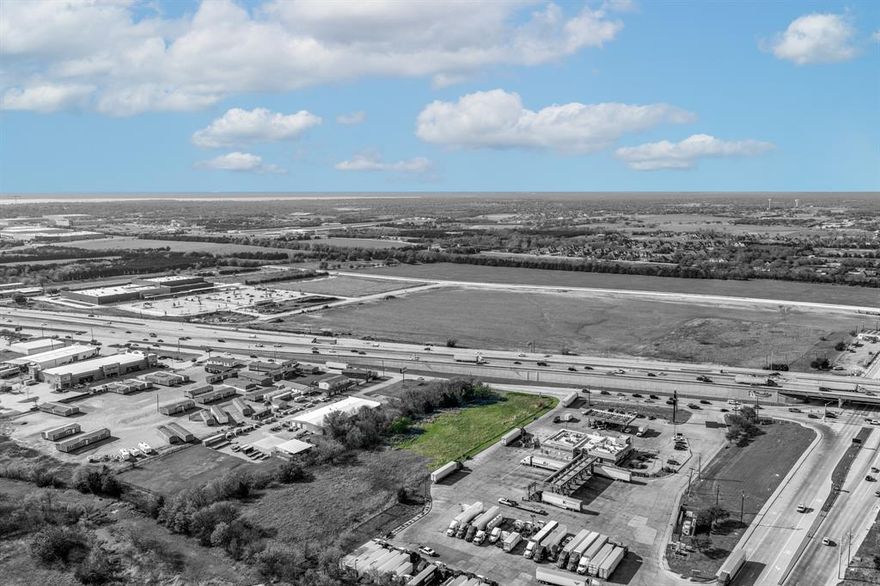 This 1.874-acre tract presents an exceptional development opportunity along one of the Dallas–Fort Worth Metroplex’s most heavily traveled corridors, with over 109,000 vehicles passing daily on Interstate 30. The site offers 185 feet of direct interstate frontage and outstanding visibility, making it ideally suited for a wide range of highway commercial and retail uses. Strategically positioned adjacent to Love’s Travel Stop, American Homes, and Cavender’s Boot City, the property benefits from an established base of regional and national co-tenants that drive consistent traffic to the immediate area. The surrounding retail environment reinforces the site’s strong commercial identity and supports a variety of development concepts including quick-service or fast-casual restaurant, hospitality, auto-related retail, or general commercial retail. The tract is zoned Highway Commercial – Retail and is located just 8.5 miles from President George Bush Turnpike and 13 miles from Interstate 635, providing excellent regional accessibility and connectivity throughout the greater DFW market. With interstate-direct frontage, proven co-tenancy, and a high-growth submarket, this site represents a compelling opportunity for developers and owner-users seeking maximum exposure along the I-30 corridor.
